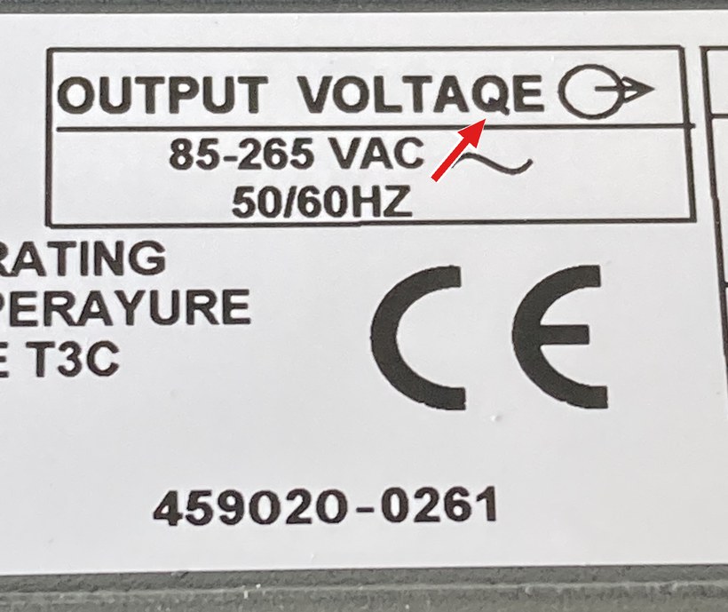Counterfeit Allen-Bradley label misspelling VOLTAGE as VOLTAQE